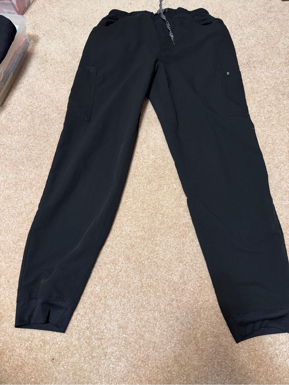 Black medical scrub jogger pants performance apparel brand Jaanuu medium